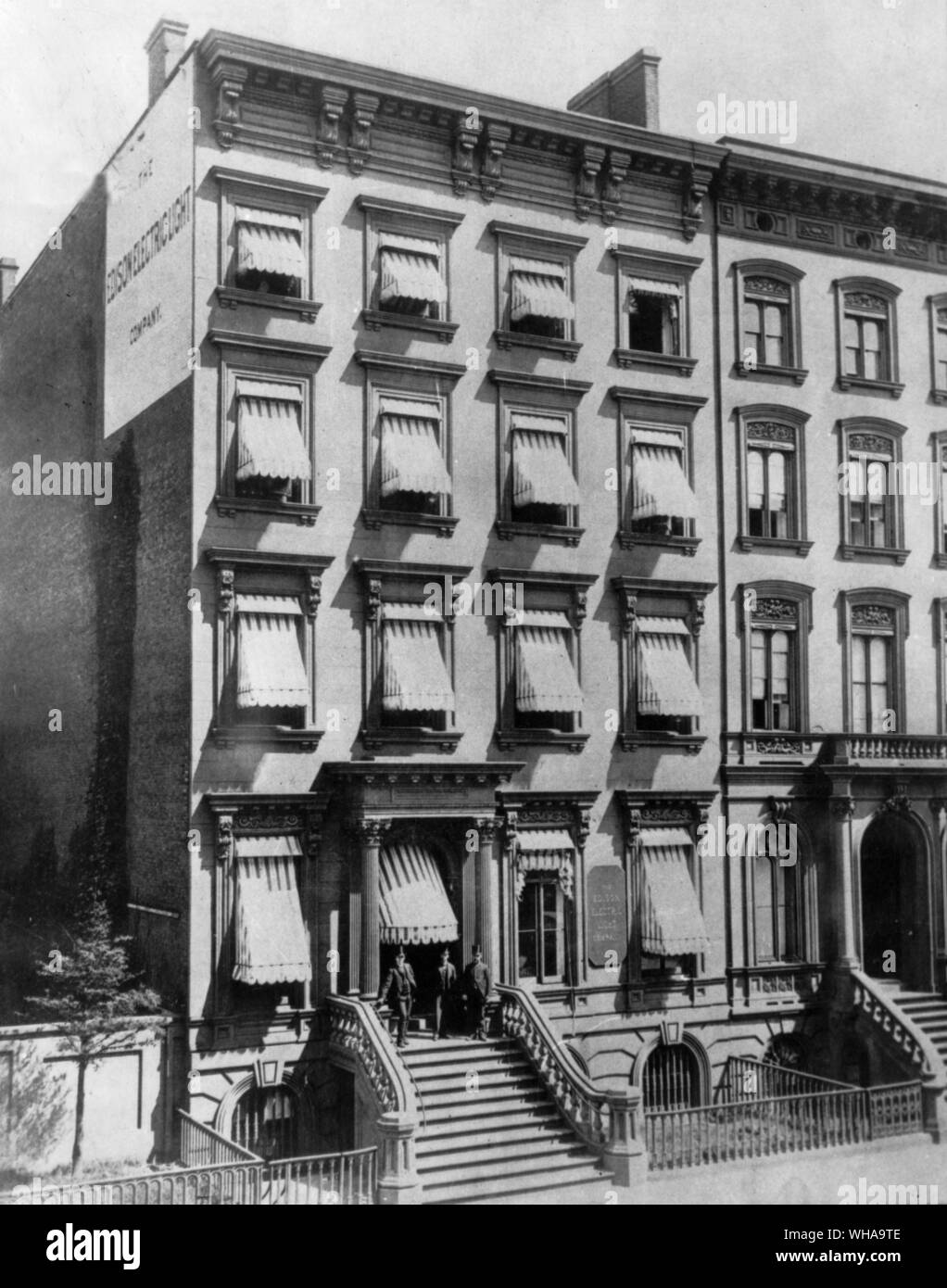 Office of Edison Electric Light Co. 65 5th Avenue New York City 1881. Mr Edison is seen at the left grasping the hand rail. Mr Charles Batchelor is seen in the centre and at the right hand is Major S B Eaton President of the Company. . Edison, Thomas Alva (the Wizard of Menlo Park) US inventor; opened research laboratory in Menlo Park, New Jersey 1876 (moved to West Orange, New Jersey 1887); invented phonograph (1st demonstrated 1877); invented incandescent electric light 1879; invented kinetograph camera and kinetoscope motion-picture viewer (patented 1891)  1847-1931 . . . . . Stock Photo