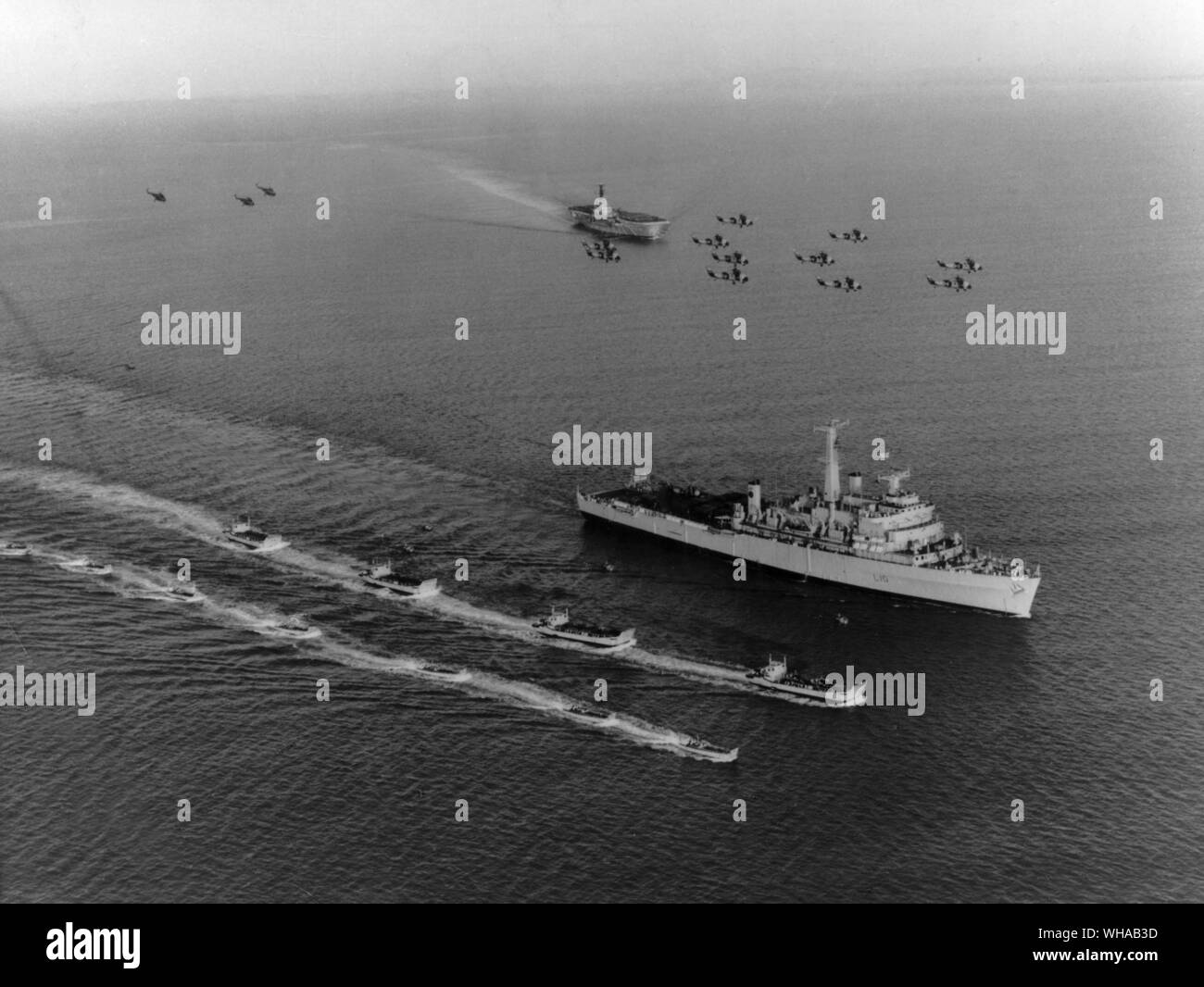 The Fearless and Bulwark with their landing craft Wessex V helicopters of 845 Naval Aircraft Squadron, Whirlwinds of the RAF and Sioux light helicopters of the Royal Marines and Army. Over 2000 troops with guns and vehicles are embarked Stock Photo