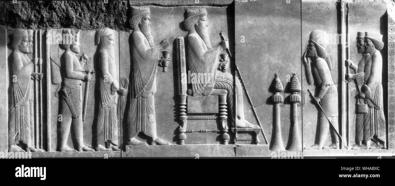 Persepolis. Darius seated on his throne with Xerxes behind, relief from Persepolis Stock Photo