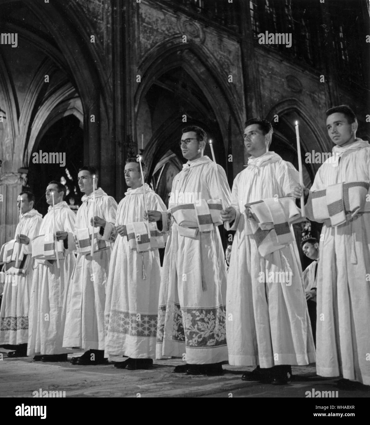 At the beginning of the rite of ordination to the priesthood, the candidate lie prostrate while the Litany of the Saints is sung. Stock Photo