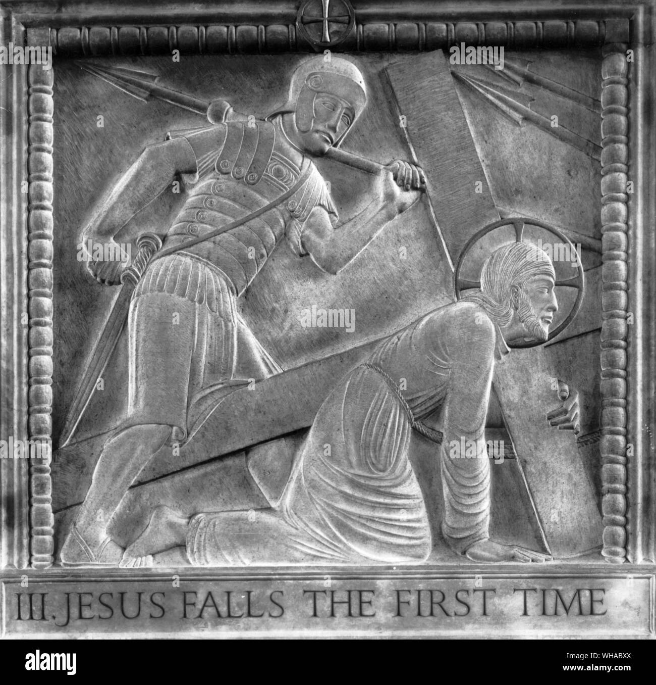 Eric Gill. Jesus falls the first time. From the stations of the Cross in Westminster Cathedral Stock Photo