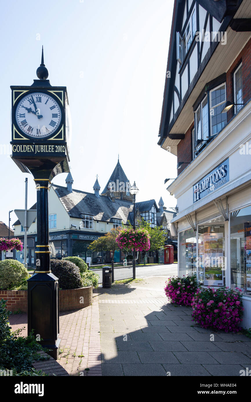 Village centre showing Golden Jubilee Clock, Chobham Road, Sunningdale, Berkshire, England, United Kingdom Stock Photo