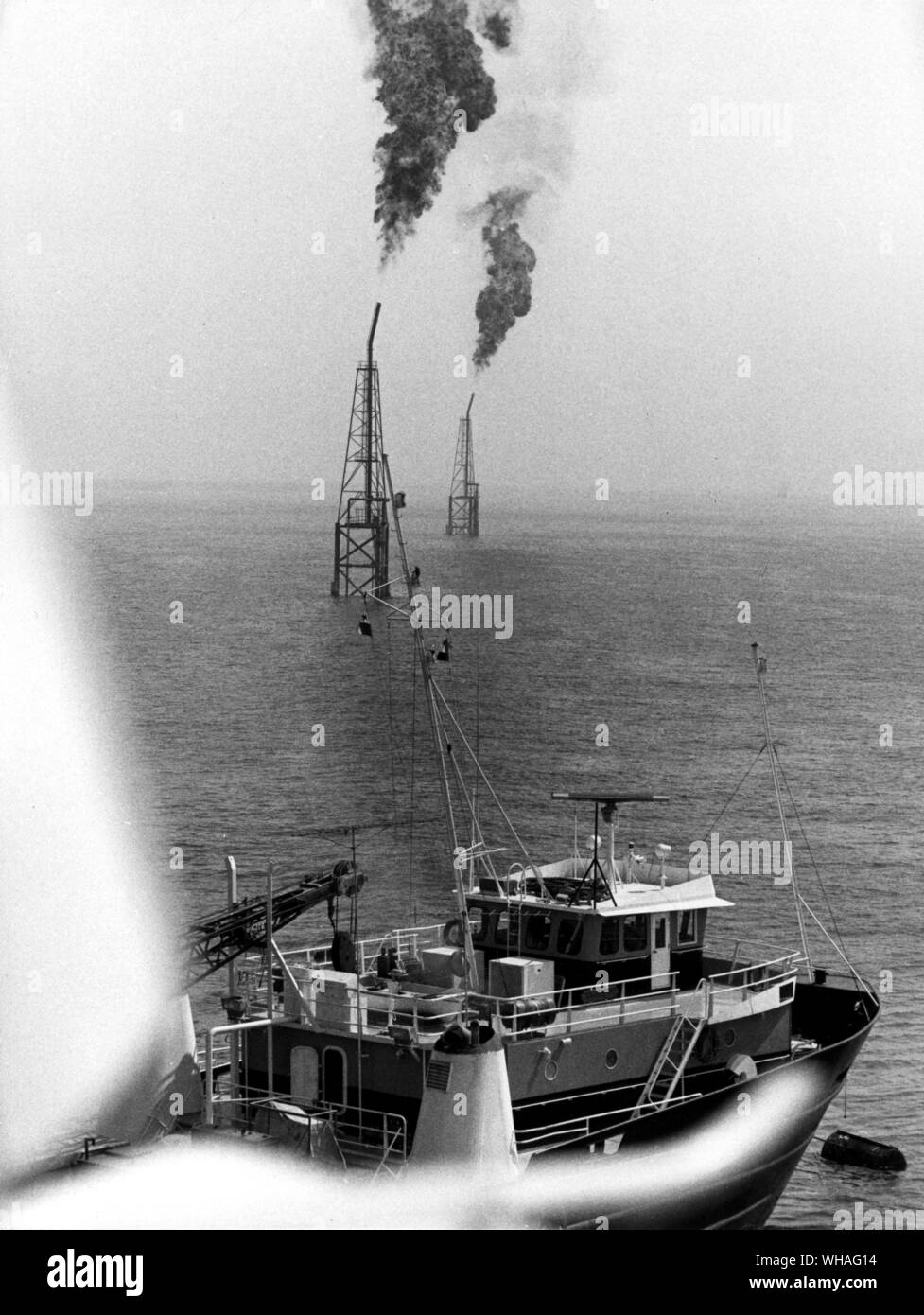 Abu Dhabi marine Areas Ltd. Flares in the Zakum field. 1973 Stock Photo