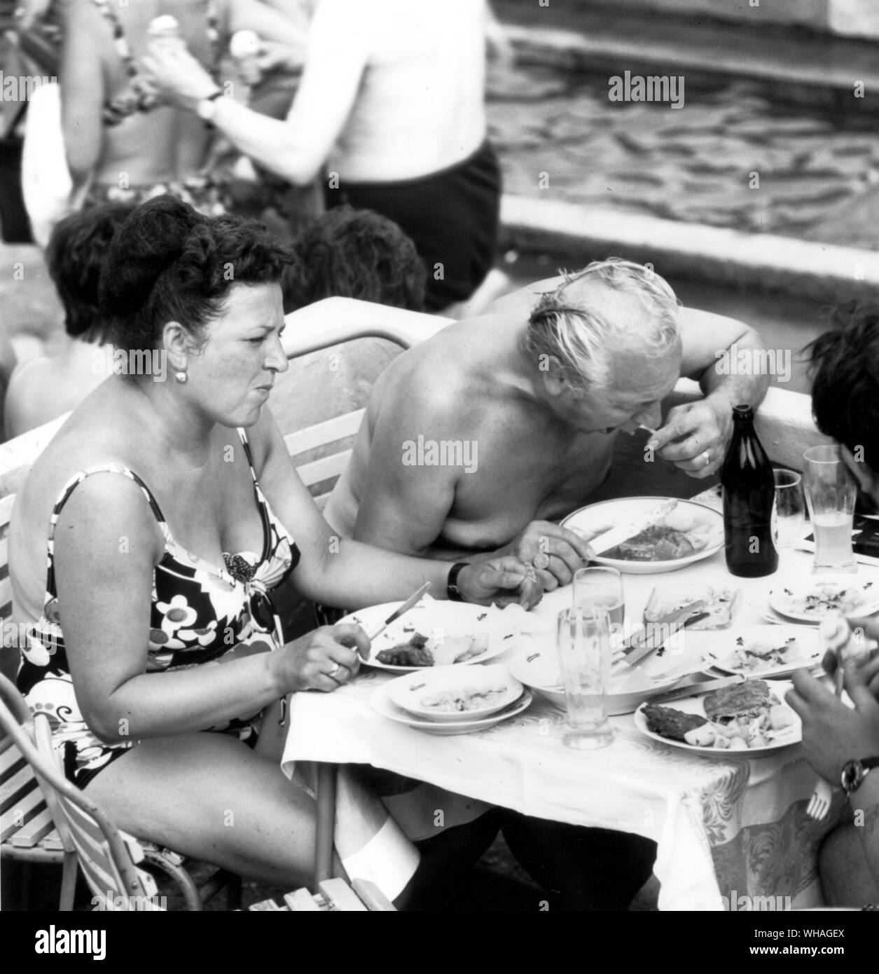Group of people eating a meal outside Stock Photo