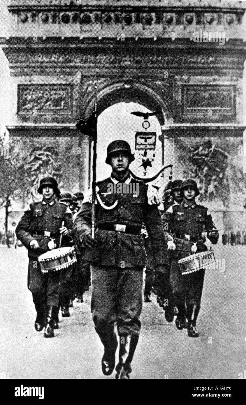 June 1940 German soldiers march through Paris. In 1944 a German General refused to obey Hitler's order to burn Paris to the ground Stock Photo