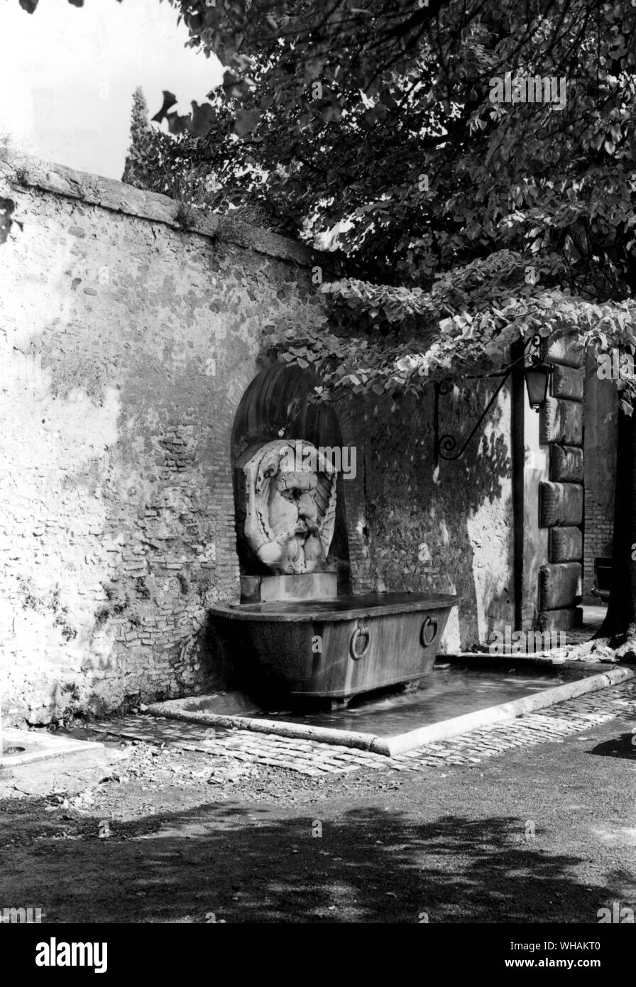 The mask fountain in the Park of the Orange Trees Stock Photo