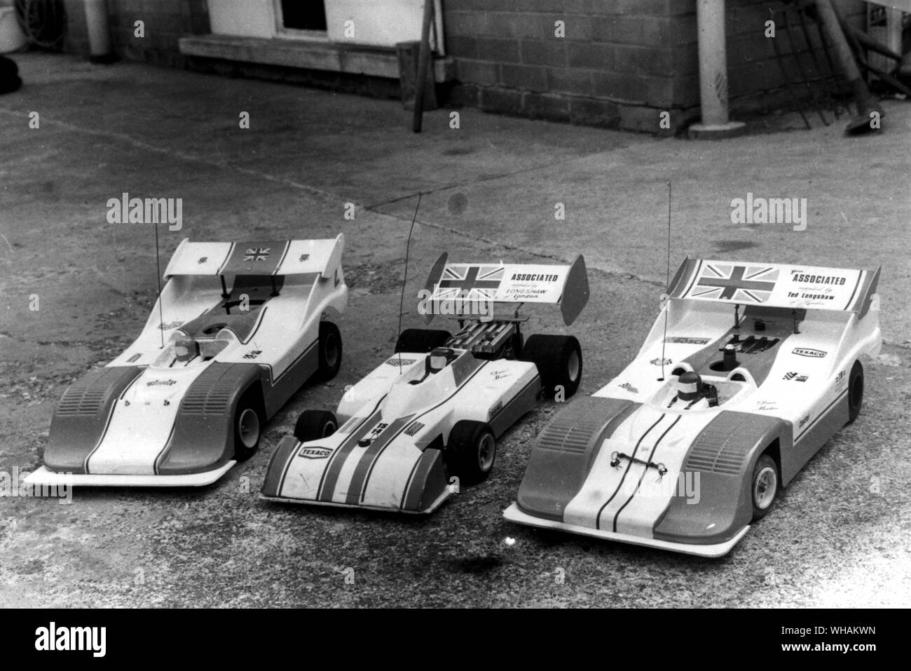 Three Associated kit cars prepared by Tom and Dave Martin for the final open meetings of the 1975 season. All the cars are powered by McCoy Veco 19 engines with slide carburettors of Toms own design. The formula car is fitted with a Surtees TS 14 body and the 2 Sports GT cars with Porsche 910/30KL bodies. Dave's RC 100 car on the right won all classes at the autumn 'Mintex' meeting at Bradford on its first competetive outing in Britain Stock Photo