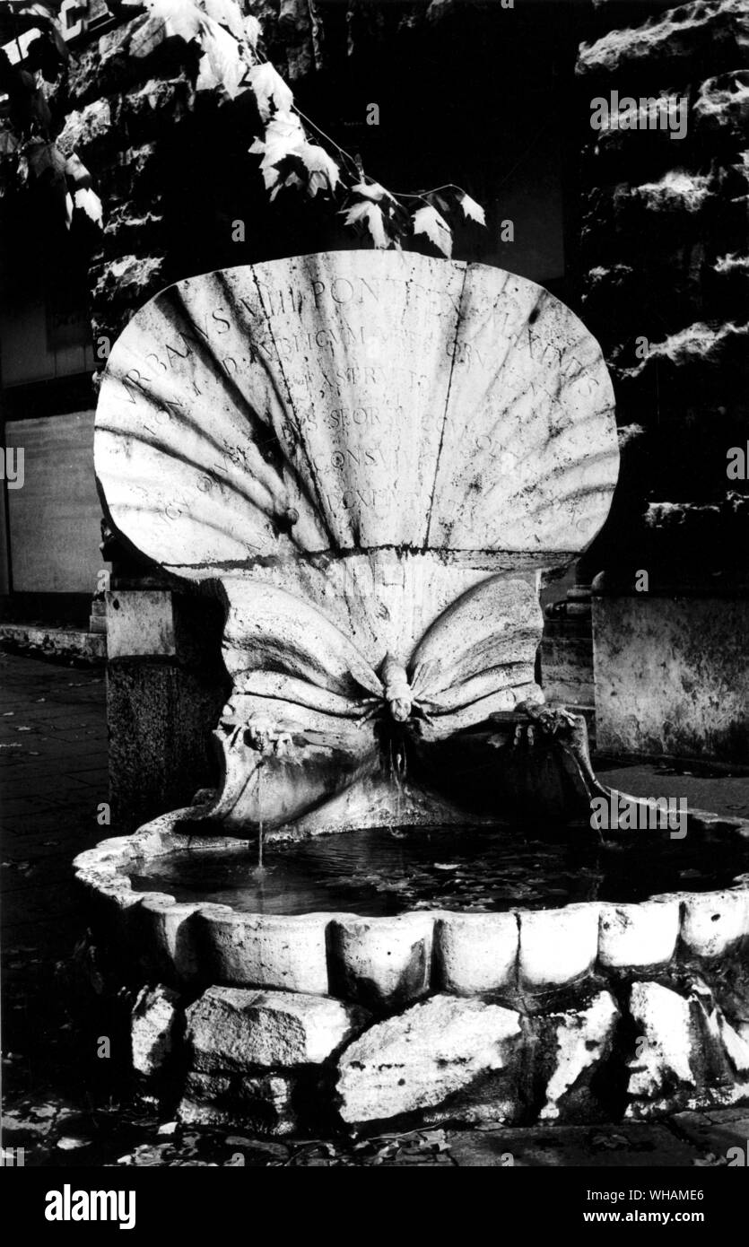 Bernini's Bee Fountain originally at the bottom corner of the Via Sistina now at the bottom of the Via Veneto Stock Photo
