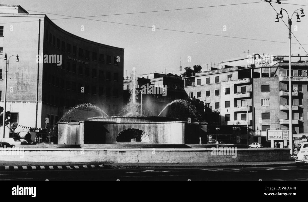The least impressive mostra in Rome, the chief fountain of the modern Peschiera Aqueduct built of concrete in the Piazza d'Eroi Stock Photo