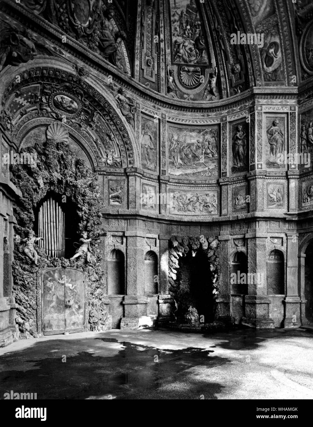 The water organ of Clement VIII in the Quirinal Palace. The dark archway in centre leads to the Forge of Vulcan, a cave in which life sized automata were formerly worked by water power. The organ has been silent for many years Stock Photo