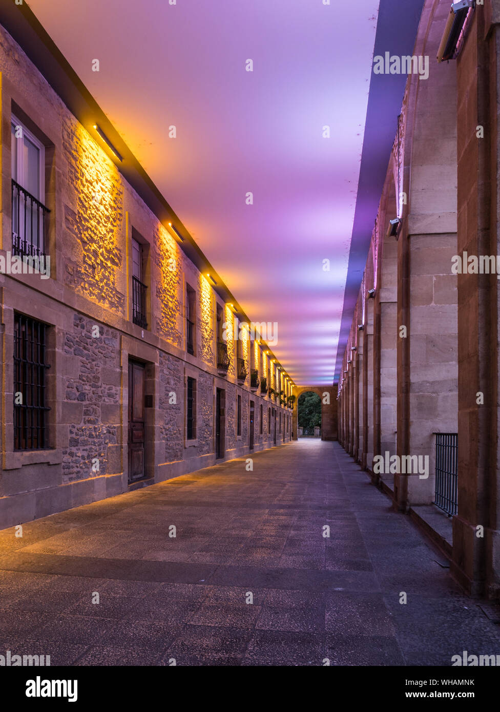 Colorful illumination of the Los Arquillos passageway in Vitoria-Gasteiz, Basque Country, Spain Stock Photo