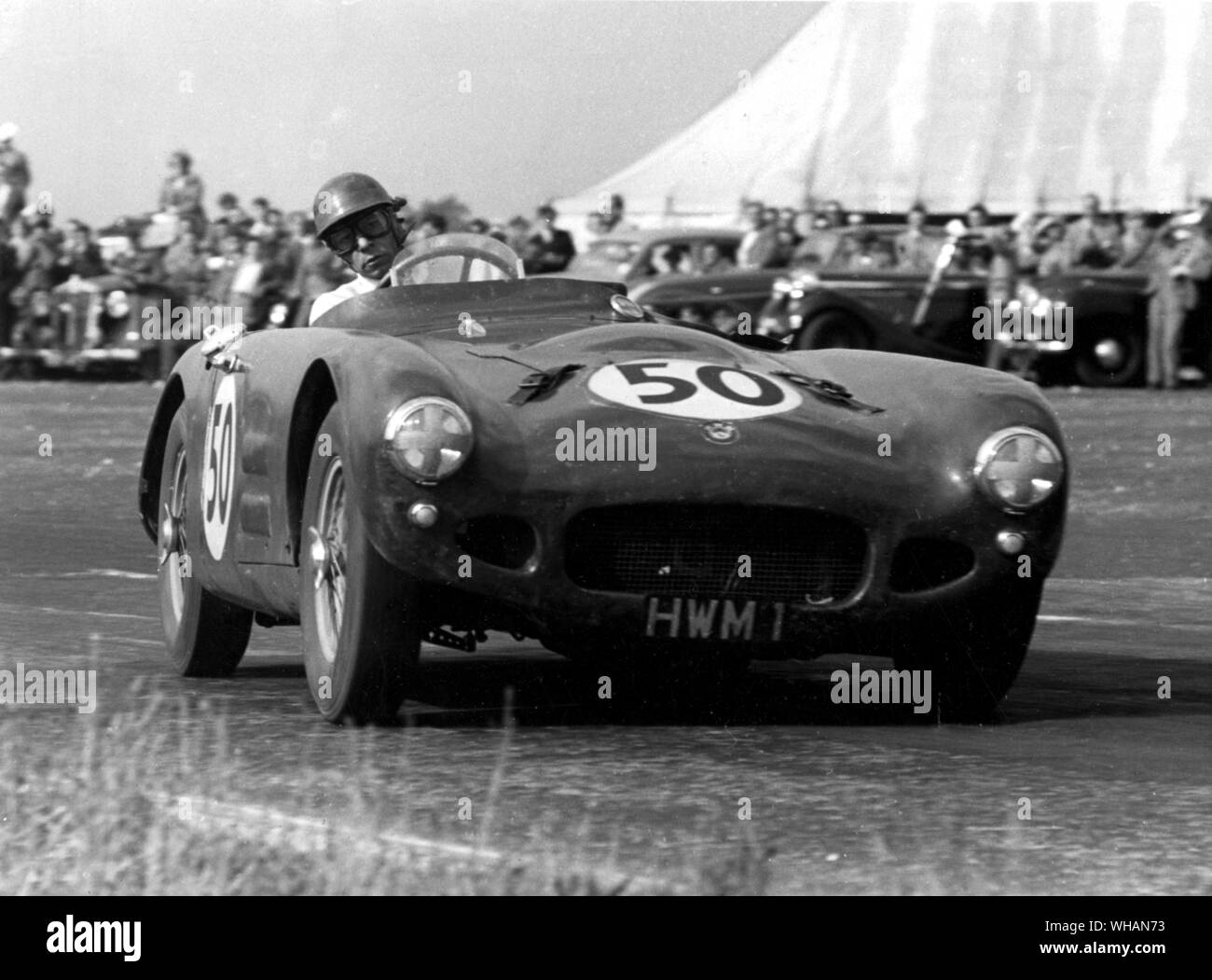 George Abecassis takes the Jaguar engined H W M  sports car through the Esses Stock Photo