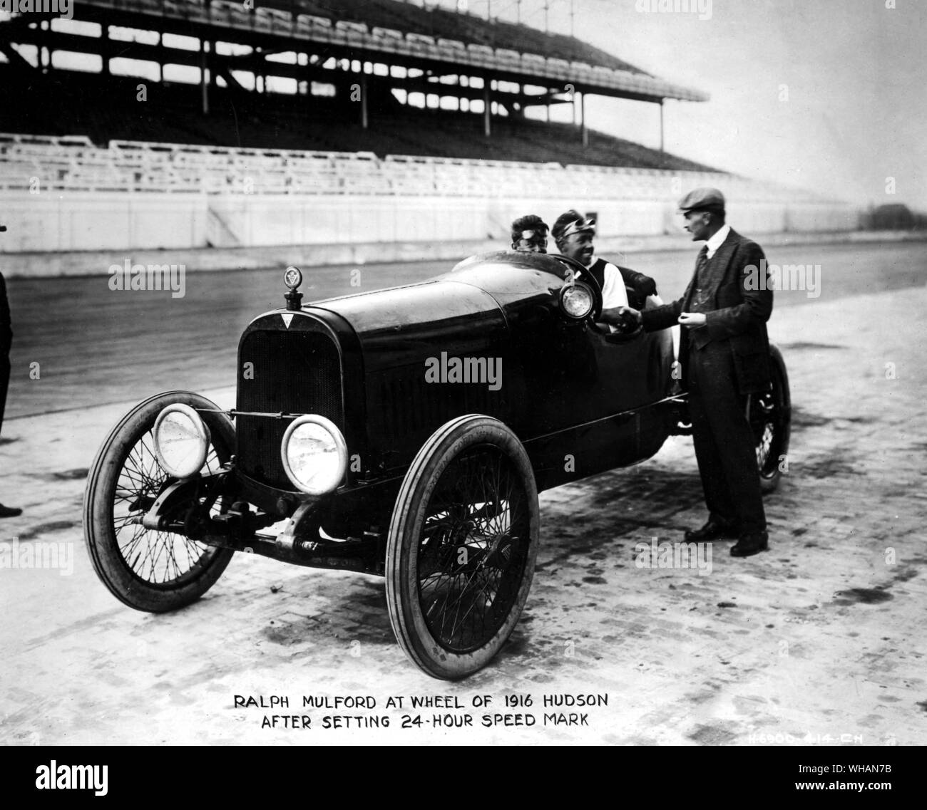 Ralph Mulford at wheel of 1916 Hudson after setting 24 hour speed mark Stock Photo