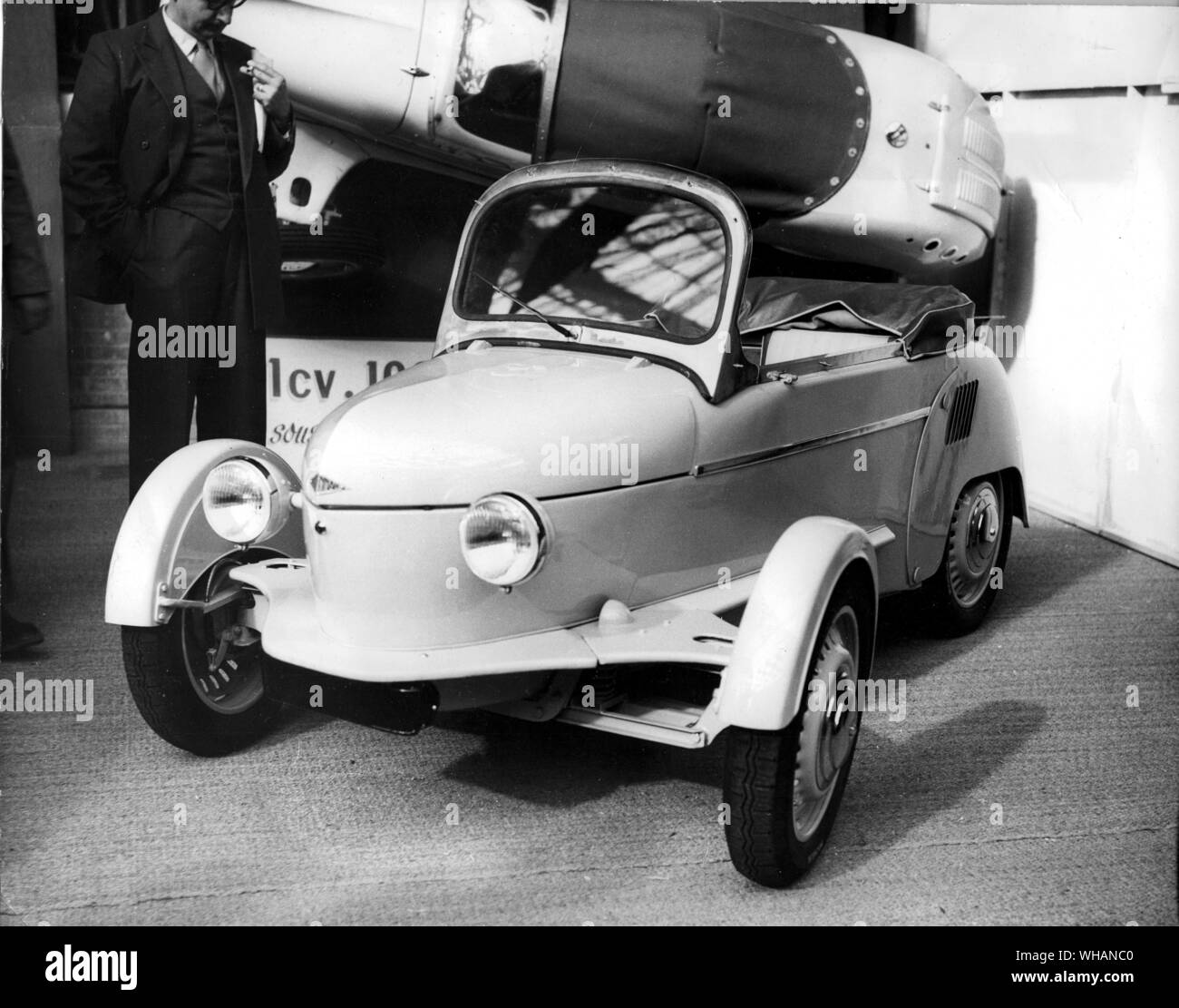 This French made two seater Reyonnah is on exhibition at the Paris car show. It's one horsepower 175cc engine gives it a speed of 62 mph and no driving licence is necessary for this car in France. 1954. Stock Photo