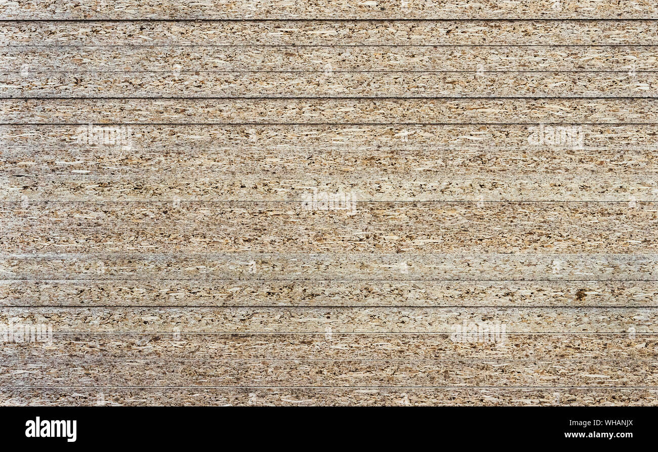 Chipboard background. Rough plywood texture. Plate of compressed ...