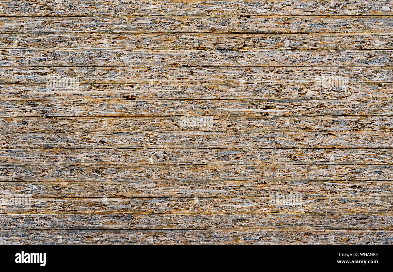 Chipboard background. Rough plywood texture. Plate of compressed ...