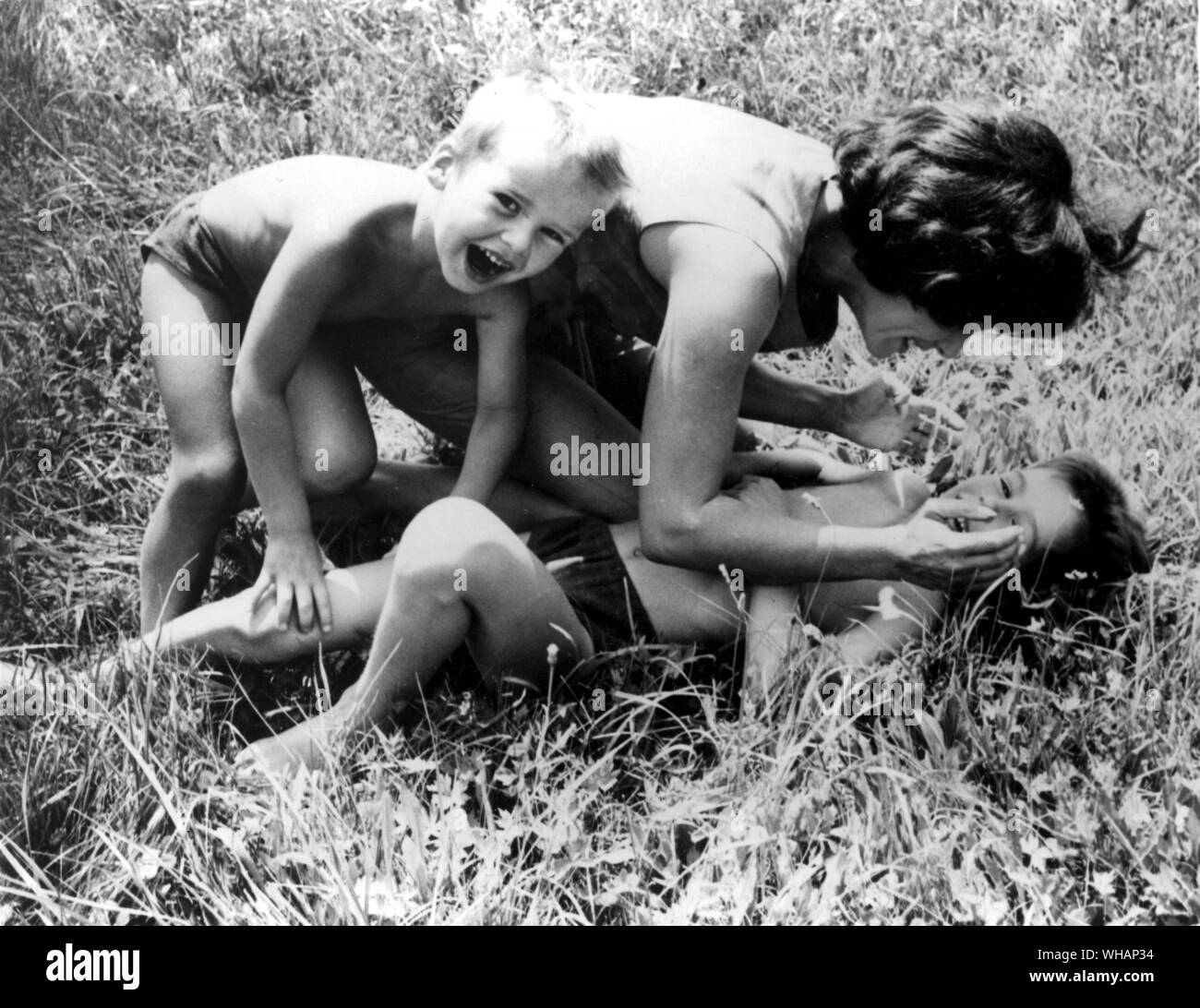 Mother playing with her children Stock Photo