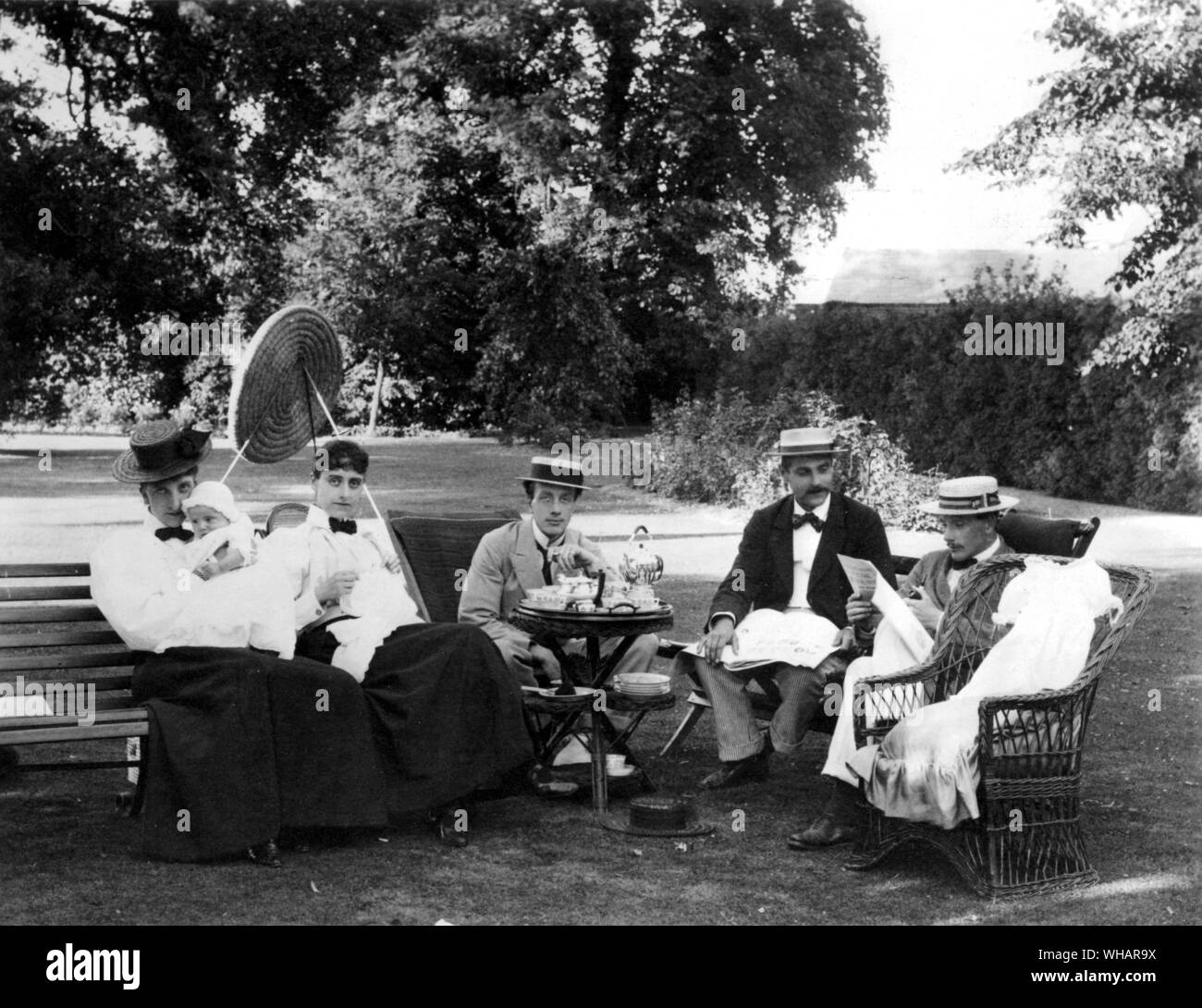 July 1897. Tea time in the garden Stock Photo
