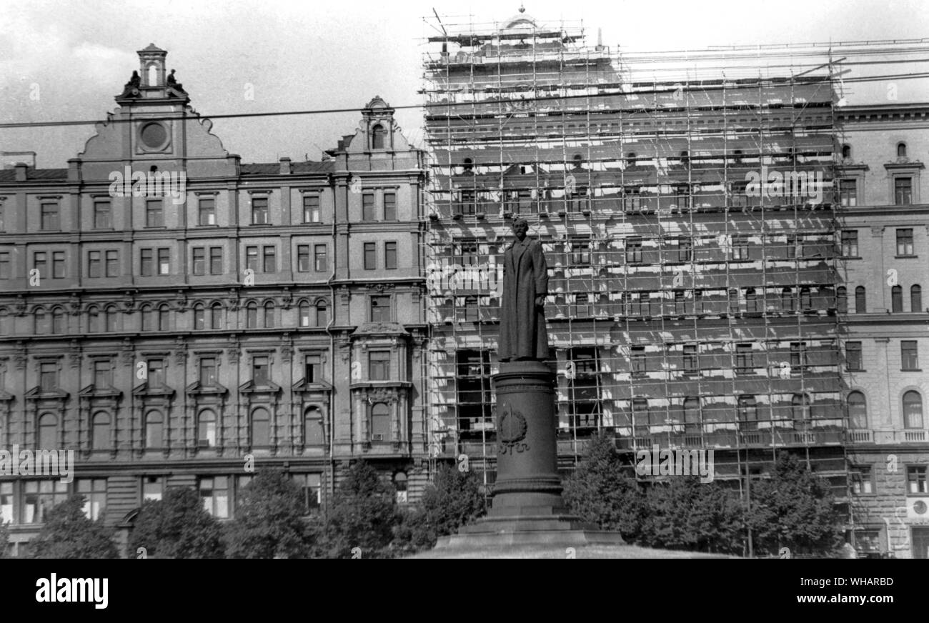 The main building of the KGB headquarters on Dzerzhinsky Square. The old portion of the structure on the left, once housed offices of the All Russian Insurance Company before the revolution. It was occupied by the first Soviet secret service the Cheka, under Dzerzhinsky in 1918. The notorious Lubyanka prison is inside this part of the building where on top a few prison observation points are visible. The addition to the building on the right was built by political prisoners and captured German soldiers after World War Two. The part of the building on the right is getting a fresh coat of paint Stock Photo