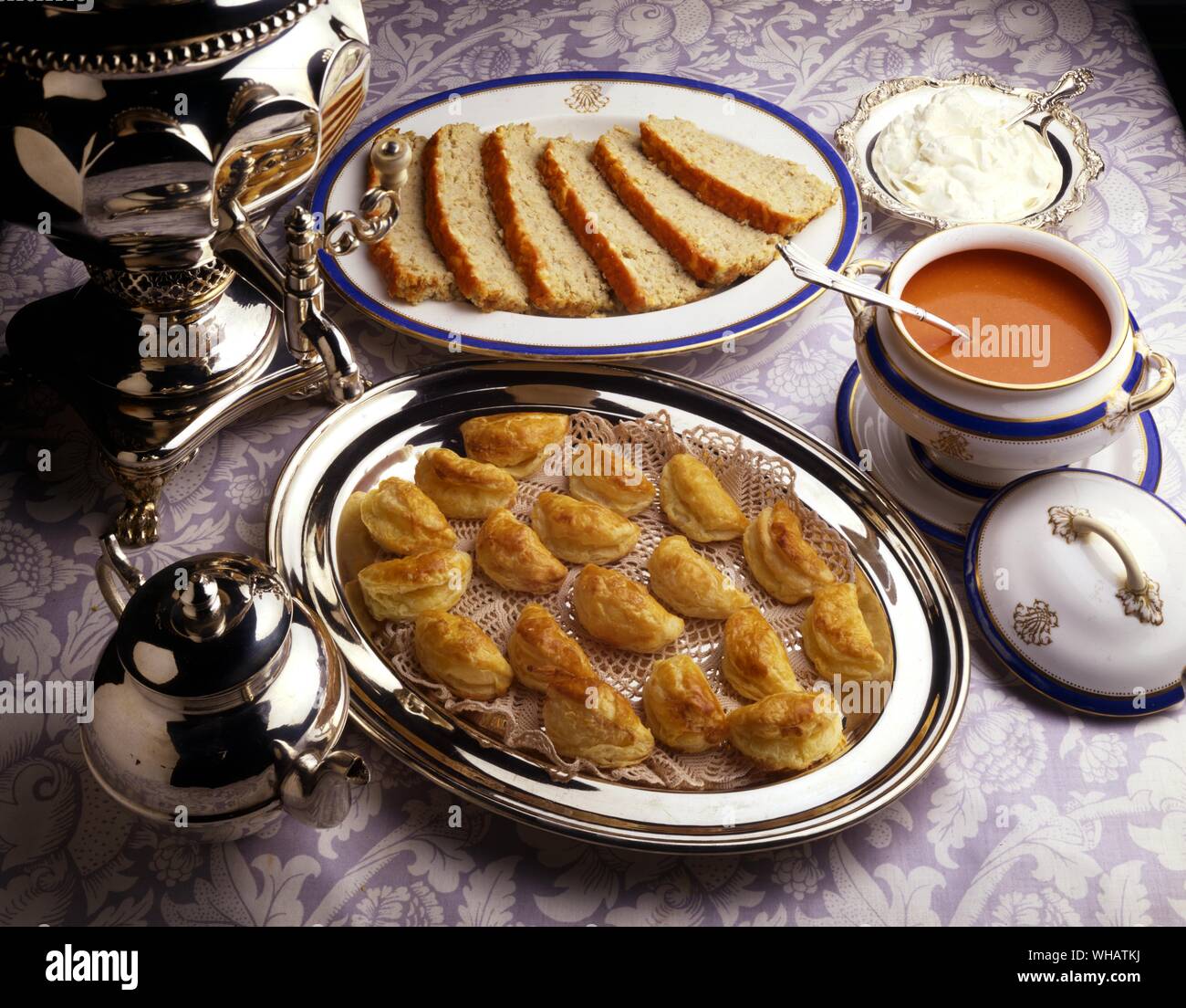 International Cooking . Bottom. Little Pies or Patties.. Pirozhki, USSR.. Top. Meat, Herring and Potato pie.. Forshmak, USSR. Stock Photo