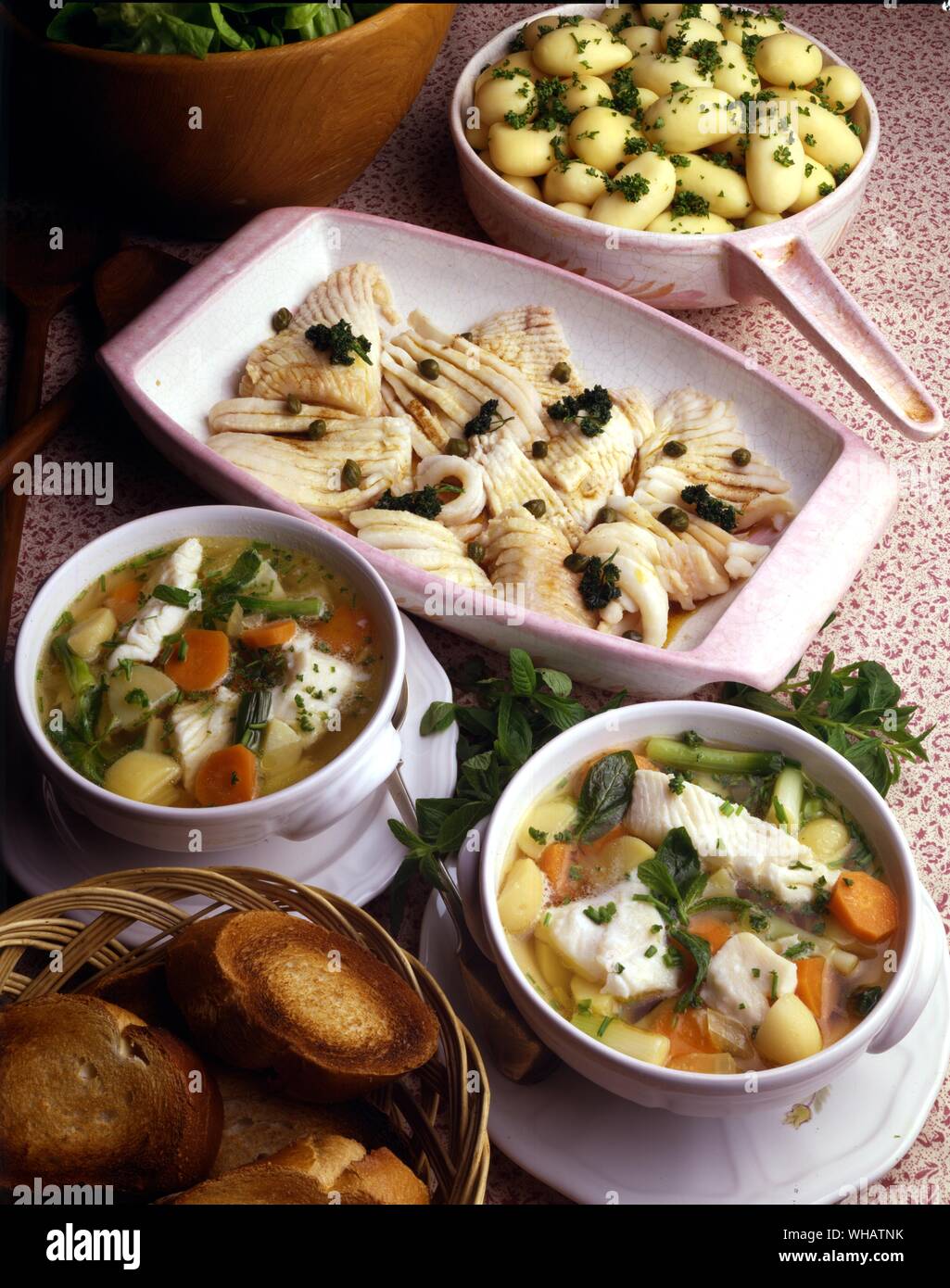 International Cooking . Top, Skate In Black Butter.. Raie Au Beurre Noir, France.. Bottom, Bouillabaisse.. France. Stock Photo