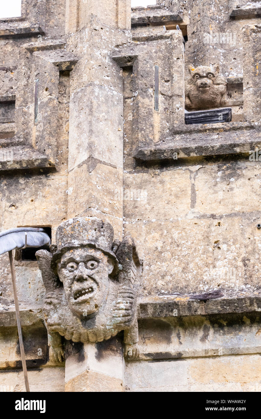 Medieval gargoyles on St Peters church (1465) in the Cotswold town of Winchcombe, Gloucestershire UK Stock Photo