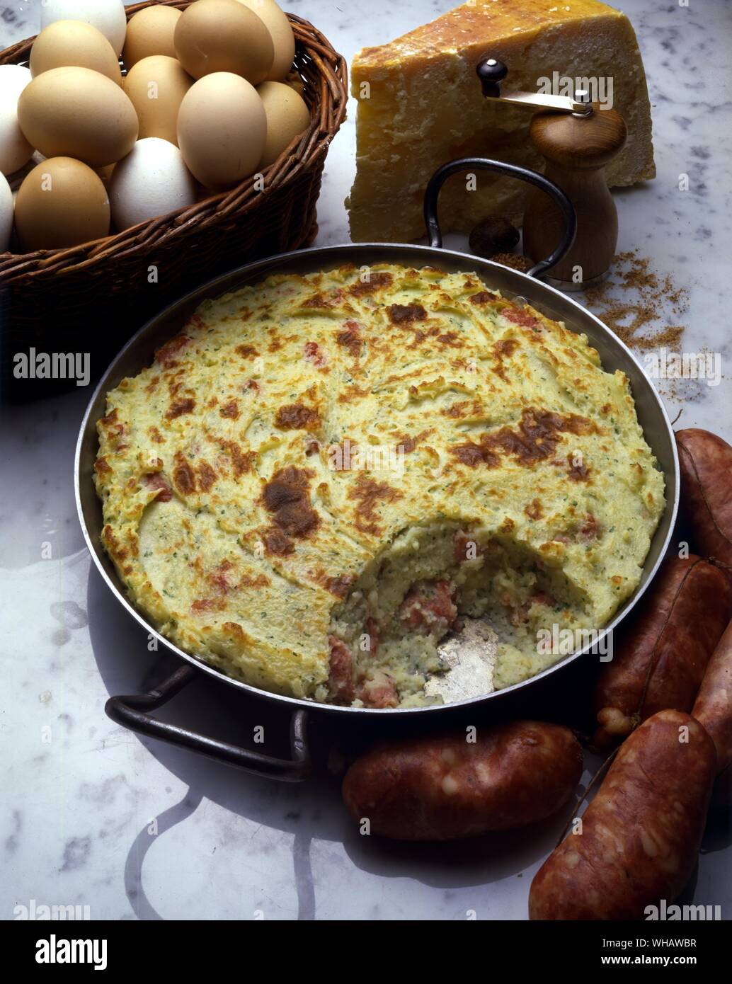 Italian Cooking By Robin Howe. . Pasticcio Di Patate Con Le Salsicce.. Pork Sausage And Potato Pie. Stock Photo