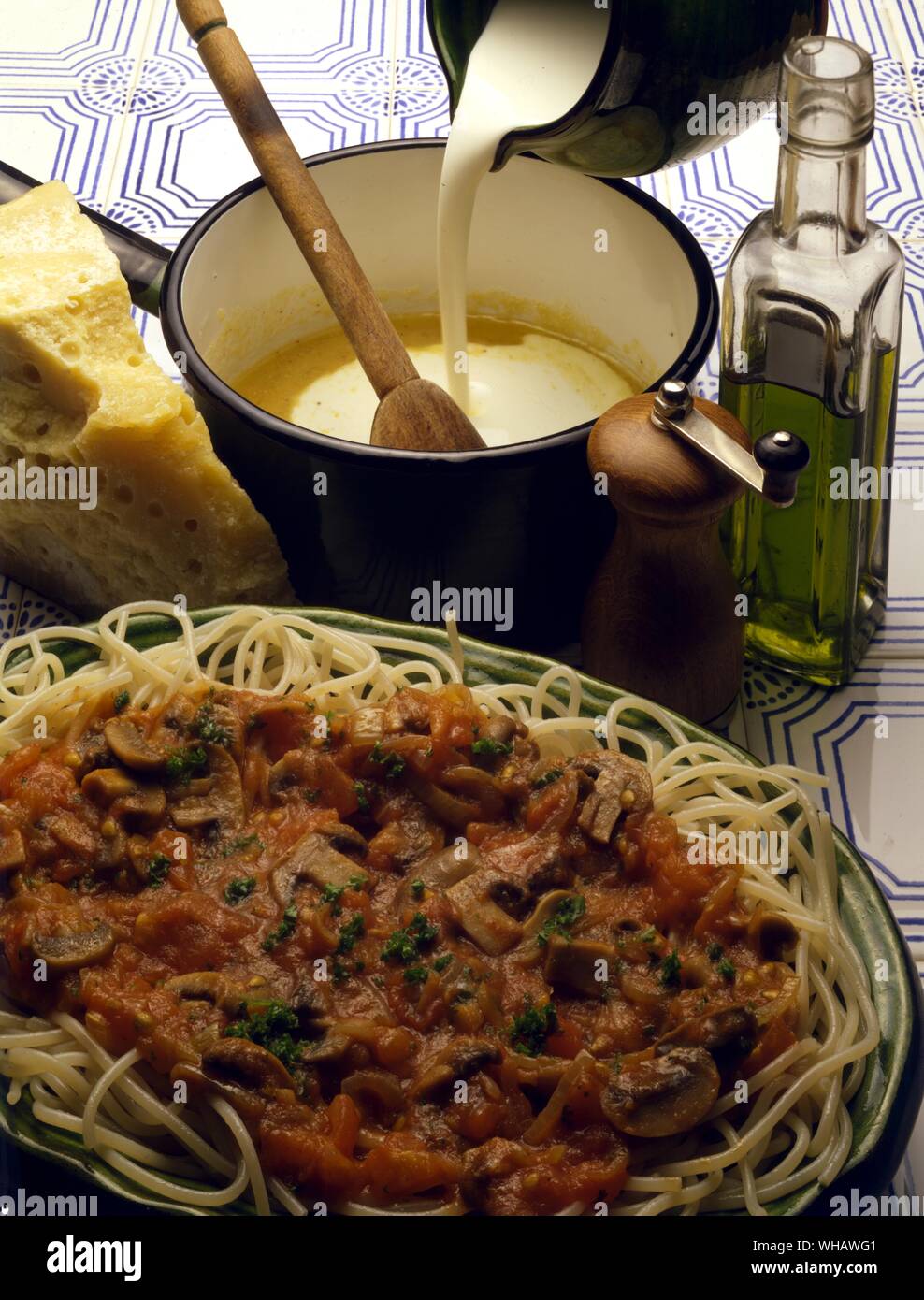 Italian Cooking . . Top.. Salsa Di Panna.. Savory Cream Sauce.. . Bottom.. Salsa Alla Cacciatora. Hunter's Sauce. Stock Photo