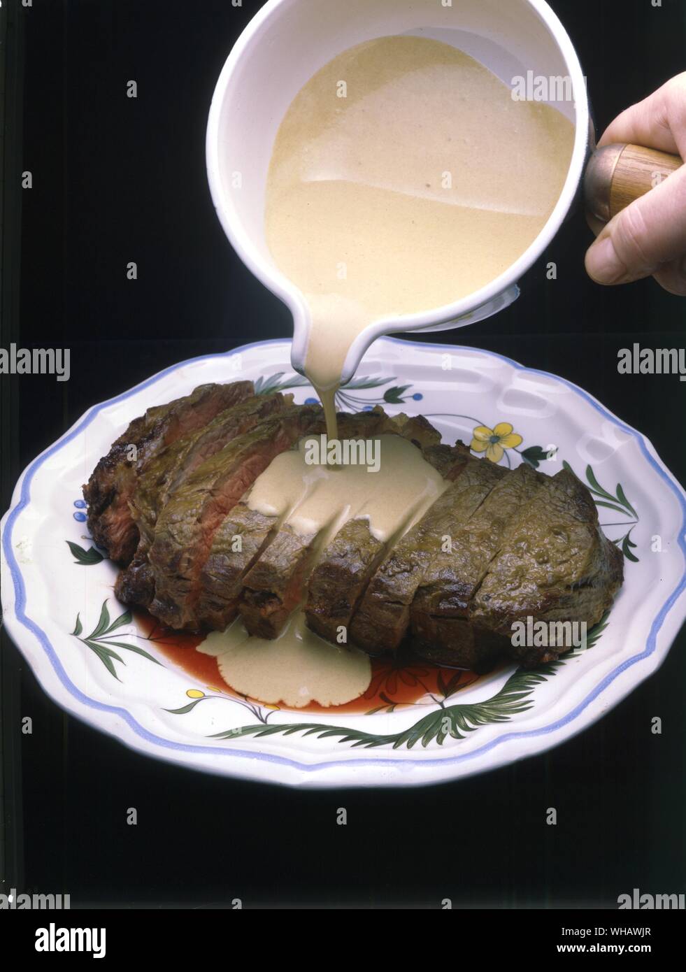 entrecote a la moutarde. sirloin steak with mustard and cream dressing Stock Photo