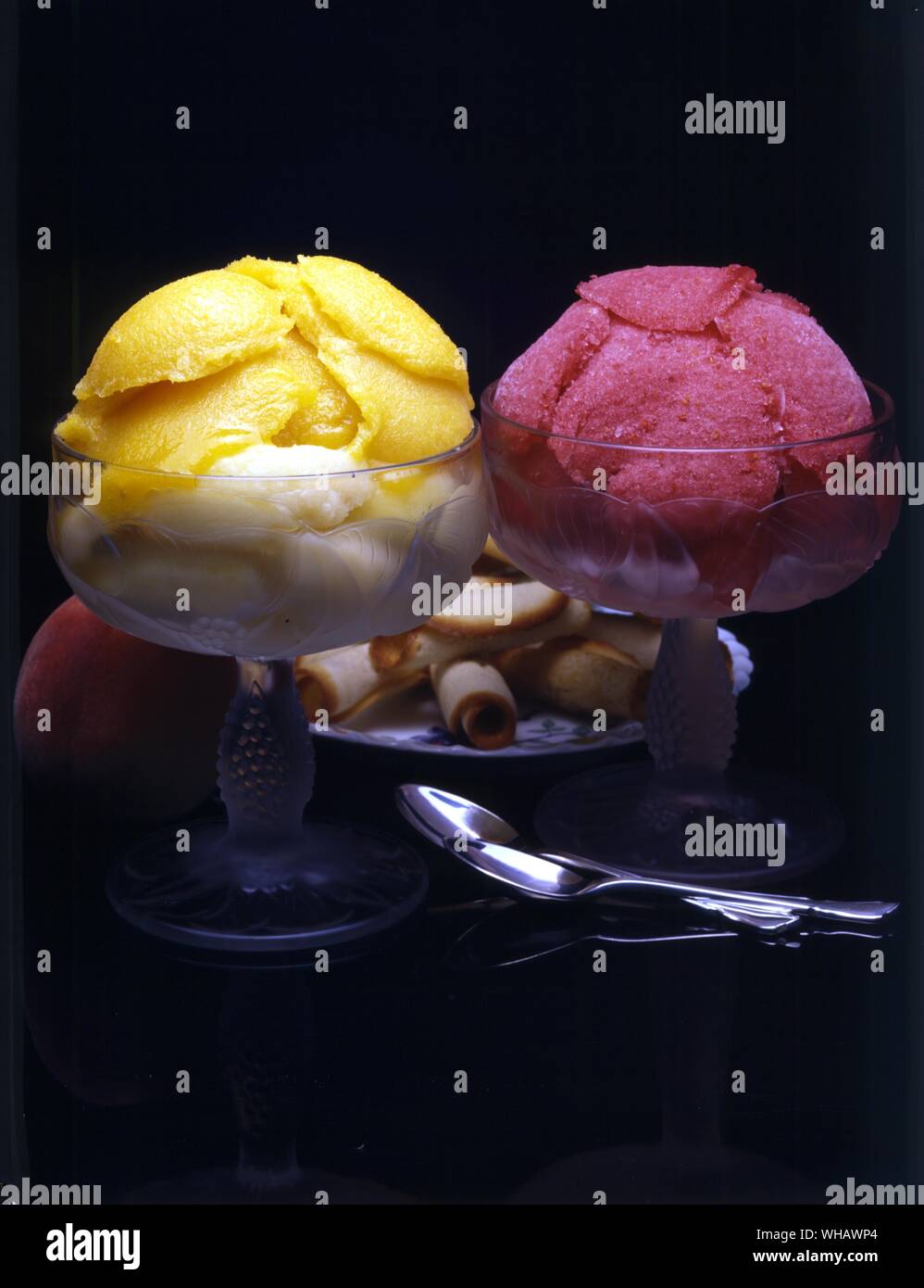 Raspberry sorbet in dish with scoop and served in sorbet glasses on doilies  Stock Photo - Alamy