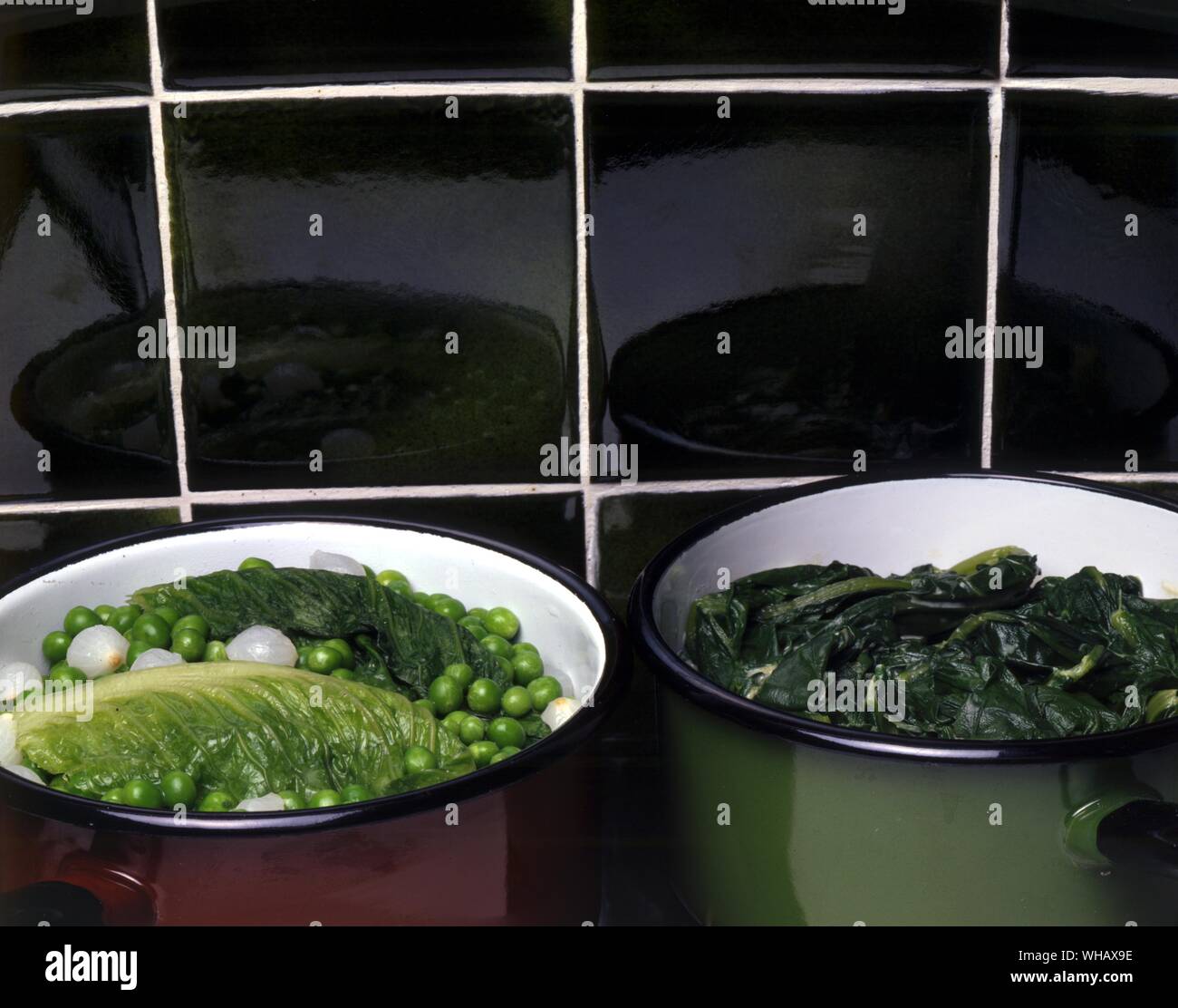 Green Peas with Lettuce. Creamed Spinach Stock Photo