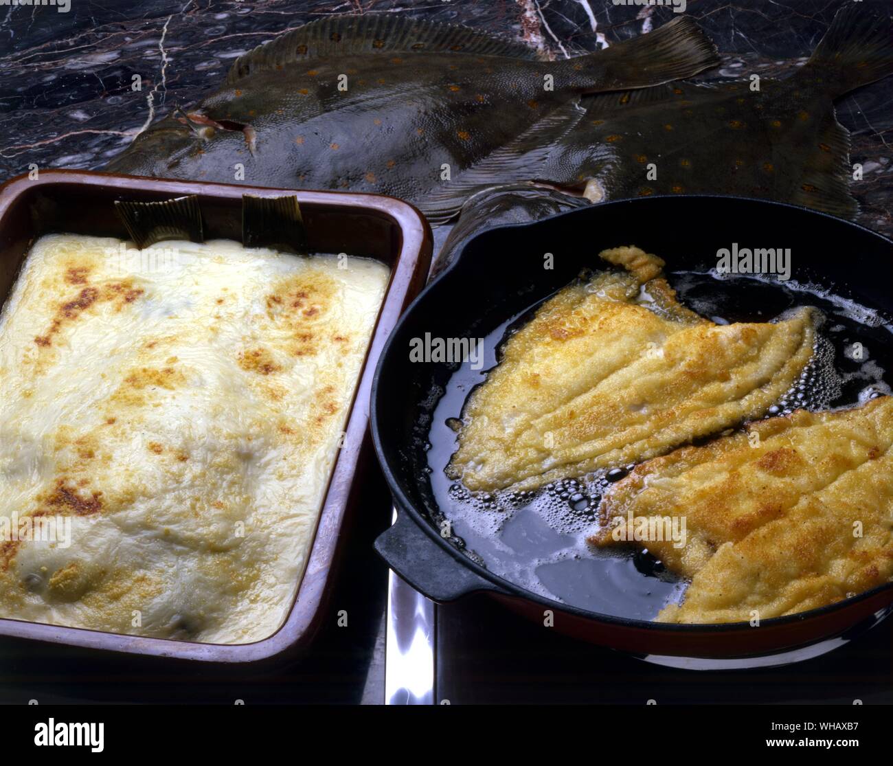 Plaice with Parmesan Cheese. Fried Plaice Stock Photo