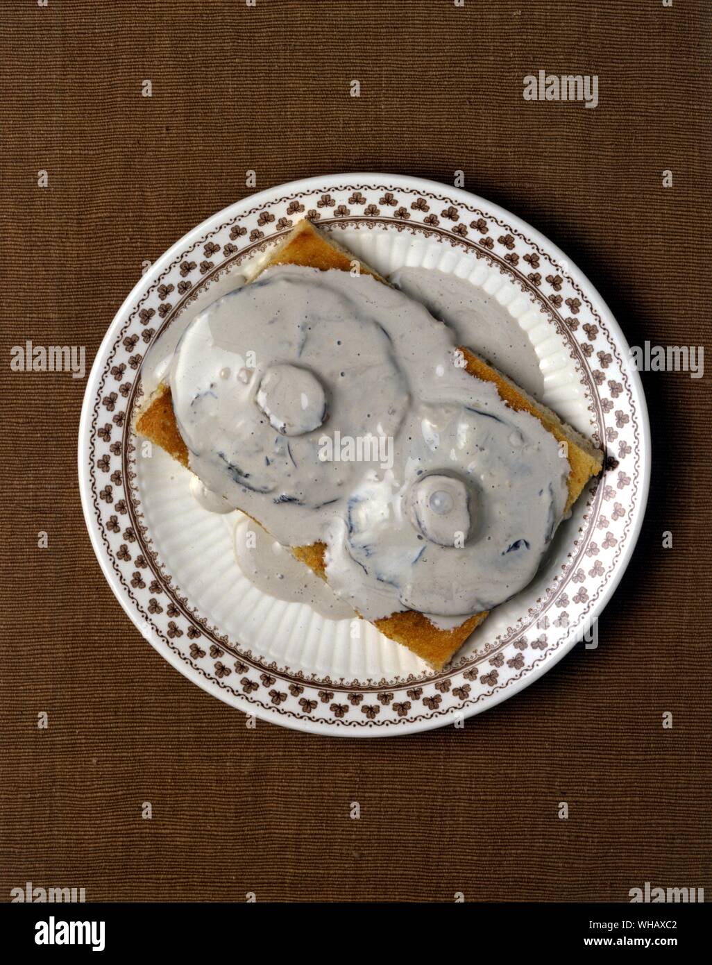 Upside down mushrooms in cream Stock Photo
