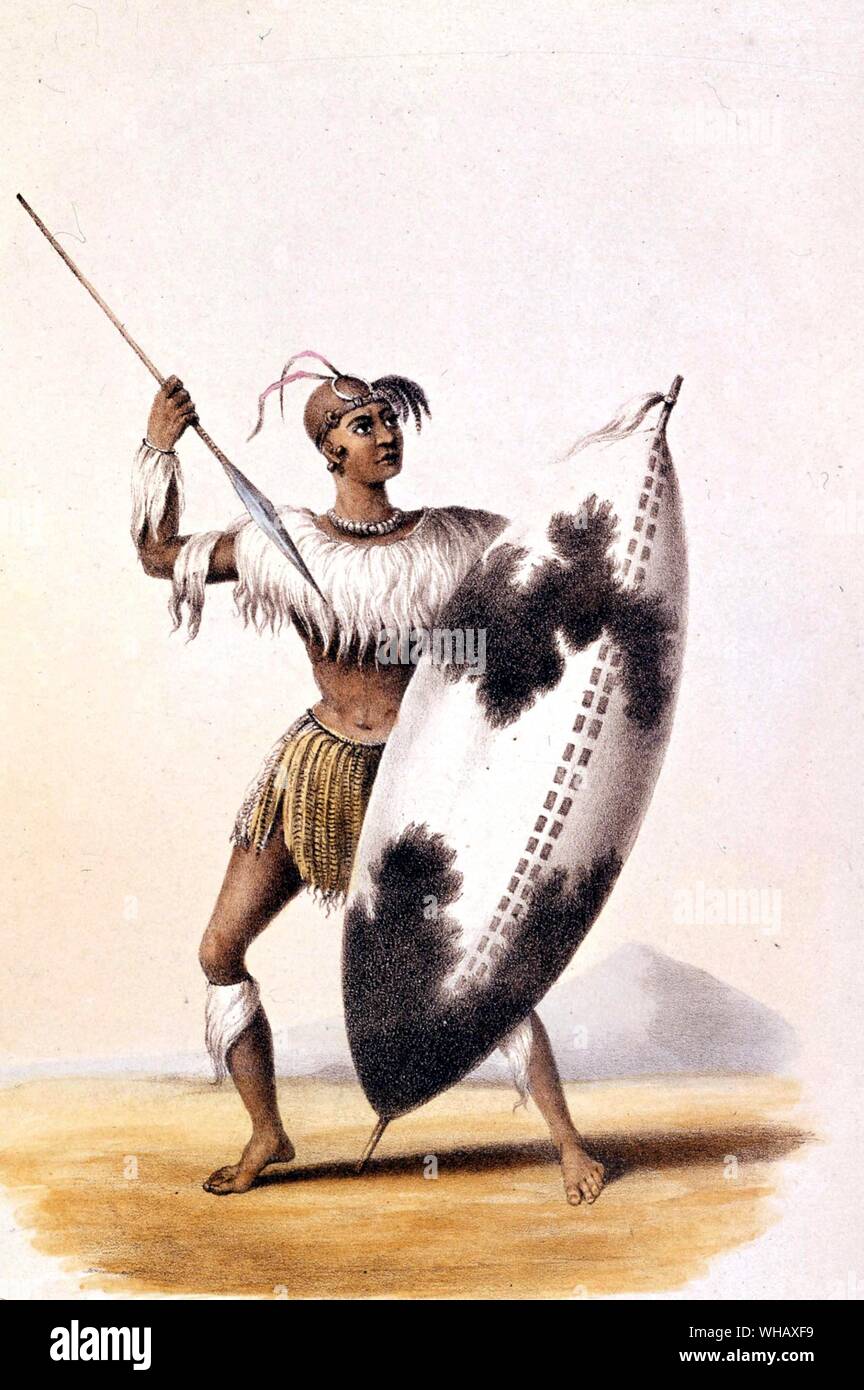 Lingap, a Matabele Warrior from Wild Sports of Southern Africa 1941. Lingap carries a large shield and a spear. He wears an outfit made from grass or feathers. Stock Photo