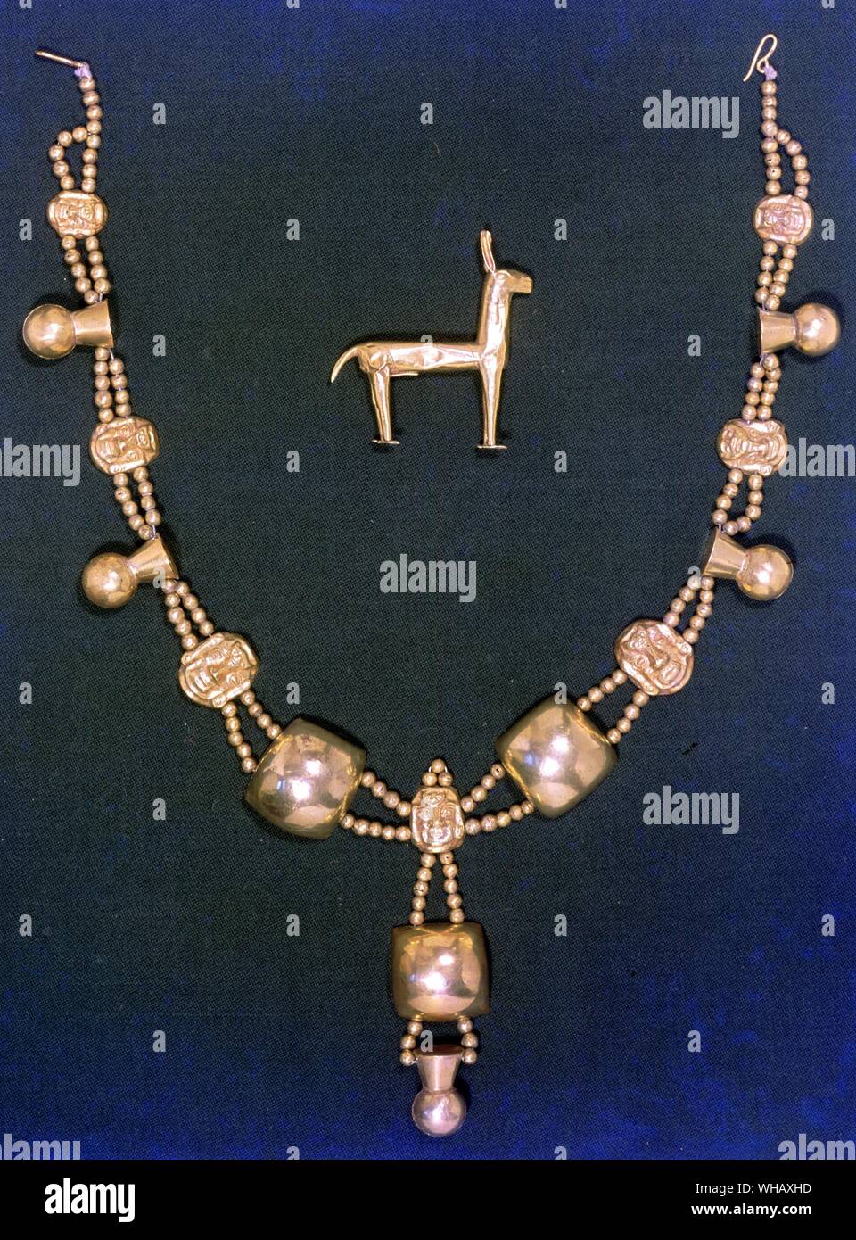 Inca Gold Necklace and Lama Chimu Culture. Stock Photo