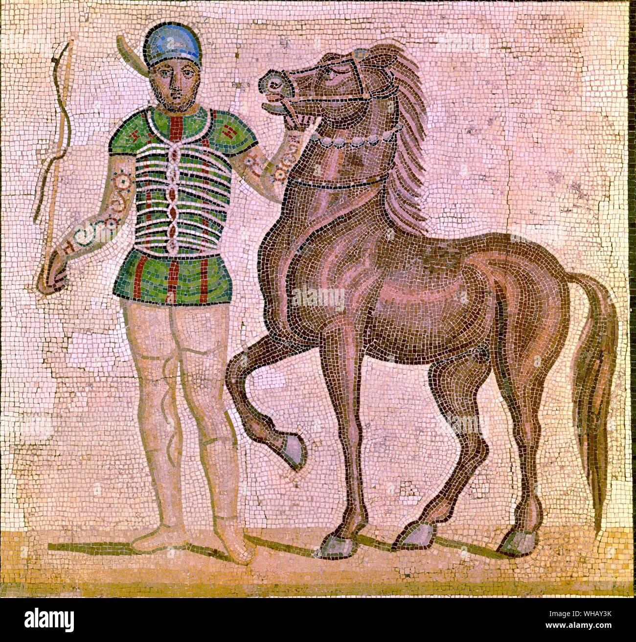 Roman Mosaic:The racing colours. Located in: Museo delle Terme, Rome. The History of Horse Racing by Roger Longrigg, page 18. . Chariot Coachman and Horse. This mosaic depicts a coachman who drove horses in the chariot races held in the amphitheatres of ancient Rome. Stock Photo