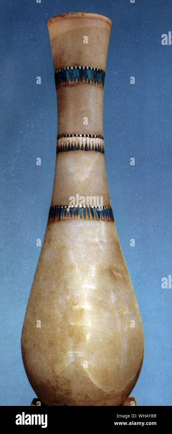 Alabaster vase with a long neck inlaid with floral garland. Tukankhamen, by Christiane Desroches Noblecourt, page 188. Stock Photo