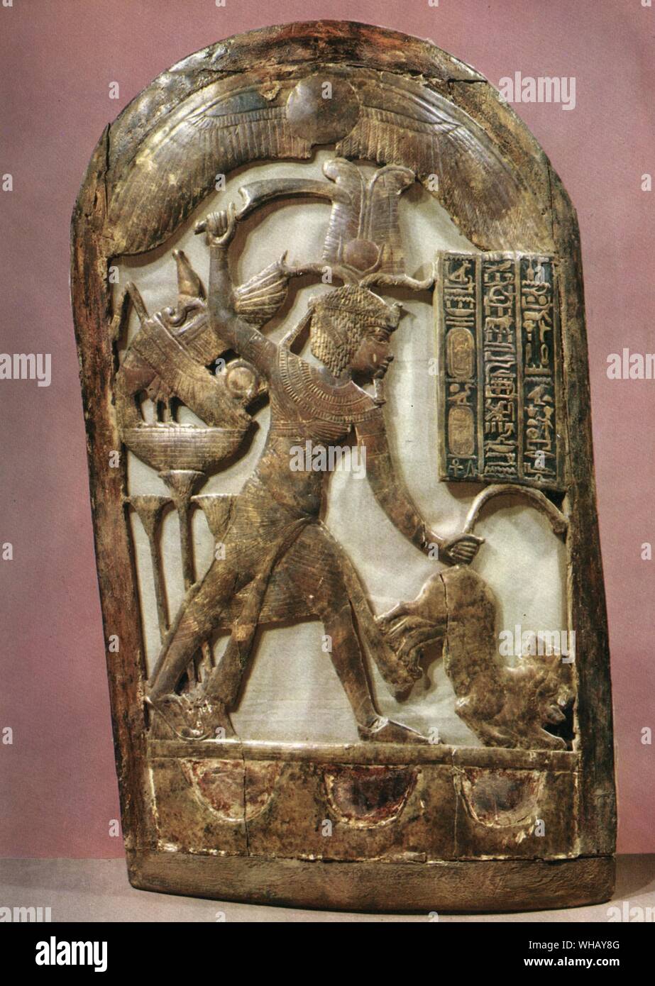 Votive shield showing the king slaying two lions.  Tukankhamen, by Christiane Desroches Noblecourt, page 79. Stock Photo