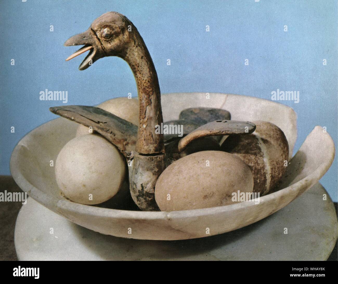 The lid of the alabaster jar, decorated with a small bowl showing a bird in its nest having just emerged from its egg.. Tukankhamen, by Christiane Desroches Noblecourt, page 227. Stock Photo