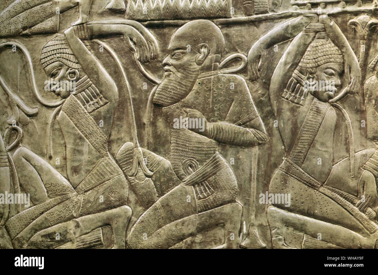 Detail from the inside of one of the state chariots. The enemies of Egypt vanquished and enslaved. Tukankhamen, by Christiane Desroches Noblecourt, page 91. Stock Photo