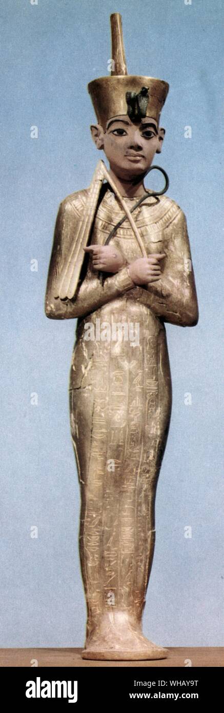 One of the many ushabtis of Tutankhamen wearing the red crown of the North. Tukankhamen by Christiane Desroches Noblecourt, page 171.. Ancient Egypt was once divided into two kingdoms. The kingdom in Lower Egypt was called the red crown and the Kingdom in Upper Egypt was known as the white crown.. A Ushabti (also called shabti or shawabti) is a small figurine of Ancient Egypt, included in the grave goods of the dead. They are human form statues that were made to serve and do labour in the afterlife of King Tut. The figure was believed to magically animate after the dead had been judged and Stock Photo