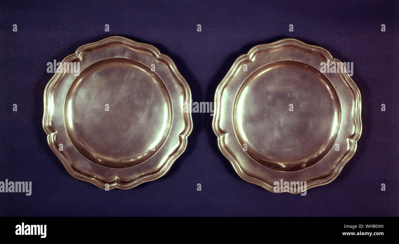 Two from a set of six Irish pewter plates, late 18th century.. Arthur Davidson, London. Stock Photo