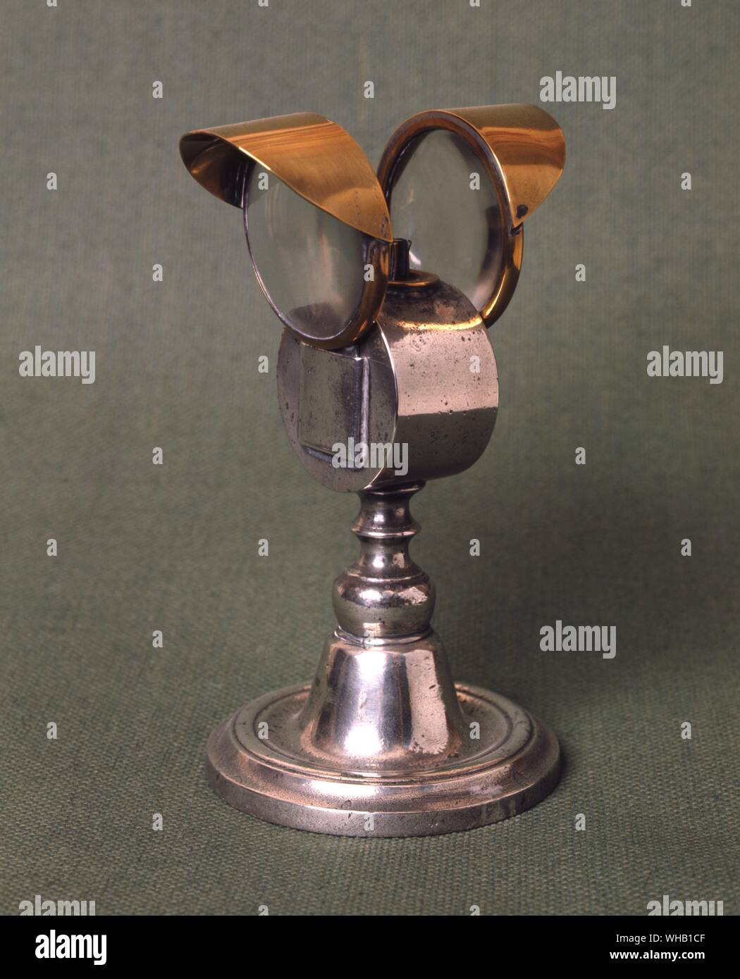 Whale oil lamp with bull's eye reflectors, American, 18th century.. American Museum in Britain. Stock Photo