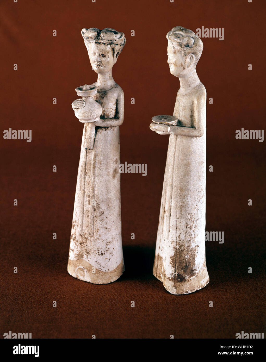 Art : Chinese sculpture and ceramics .. Pair of women attendants , Pale buss pottery .. Oriental Museum , Durham Stock Photo