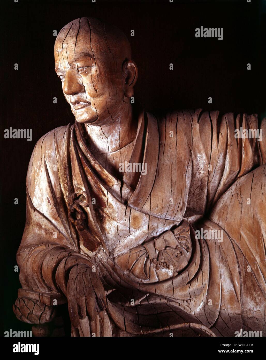 Wood figure of a Lohan Yuan Dynasty - . China, Yuan dynasty is 1260-1368 . Stock Photo