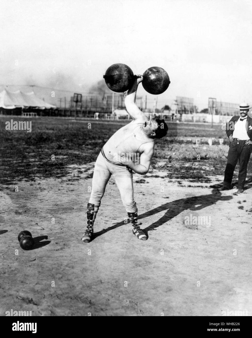Fred Winters (United States), winner of the Dumb Bell Competition at the World Fair Olympic Games at St Louis 1904. The Olympic Games page 51.. . . . Stock Photo