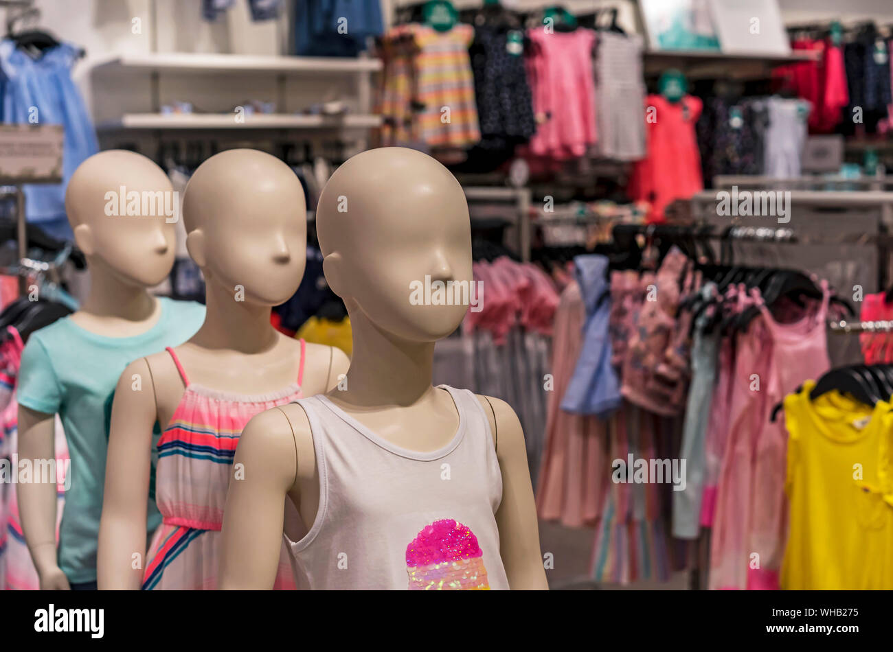 Children's mannequins with summer clothes in the store Stock Photo Alamy
