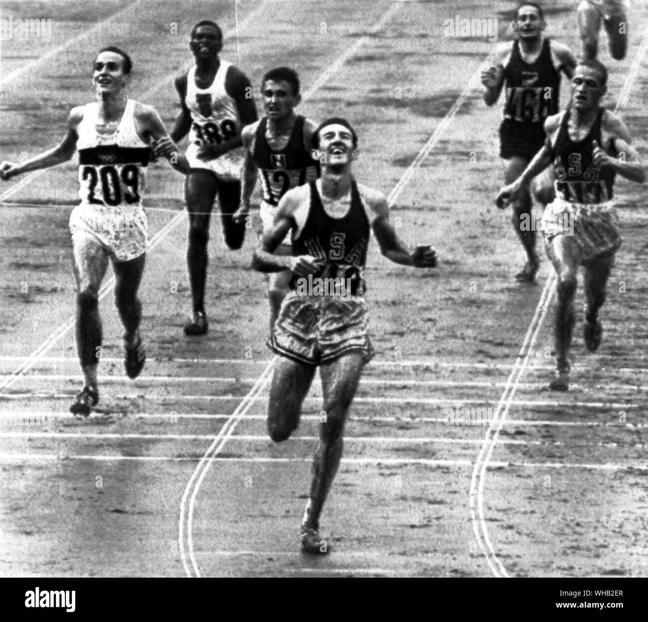 Japan, Tokyo Olympic Games, 1964: 5000m final. Robert Keyser Schul of West Milton, Ohio (USA) wins the gold medal in 13:49.8 with Harald Norpoth (Germany, ) and William S Dellinger (USA, ) behind him. Kip Keino of Kenya was 5th. . Stock Photo