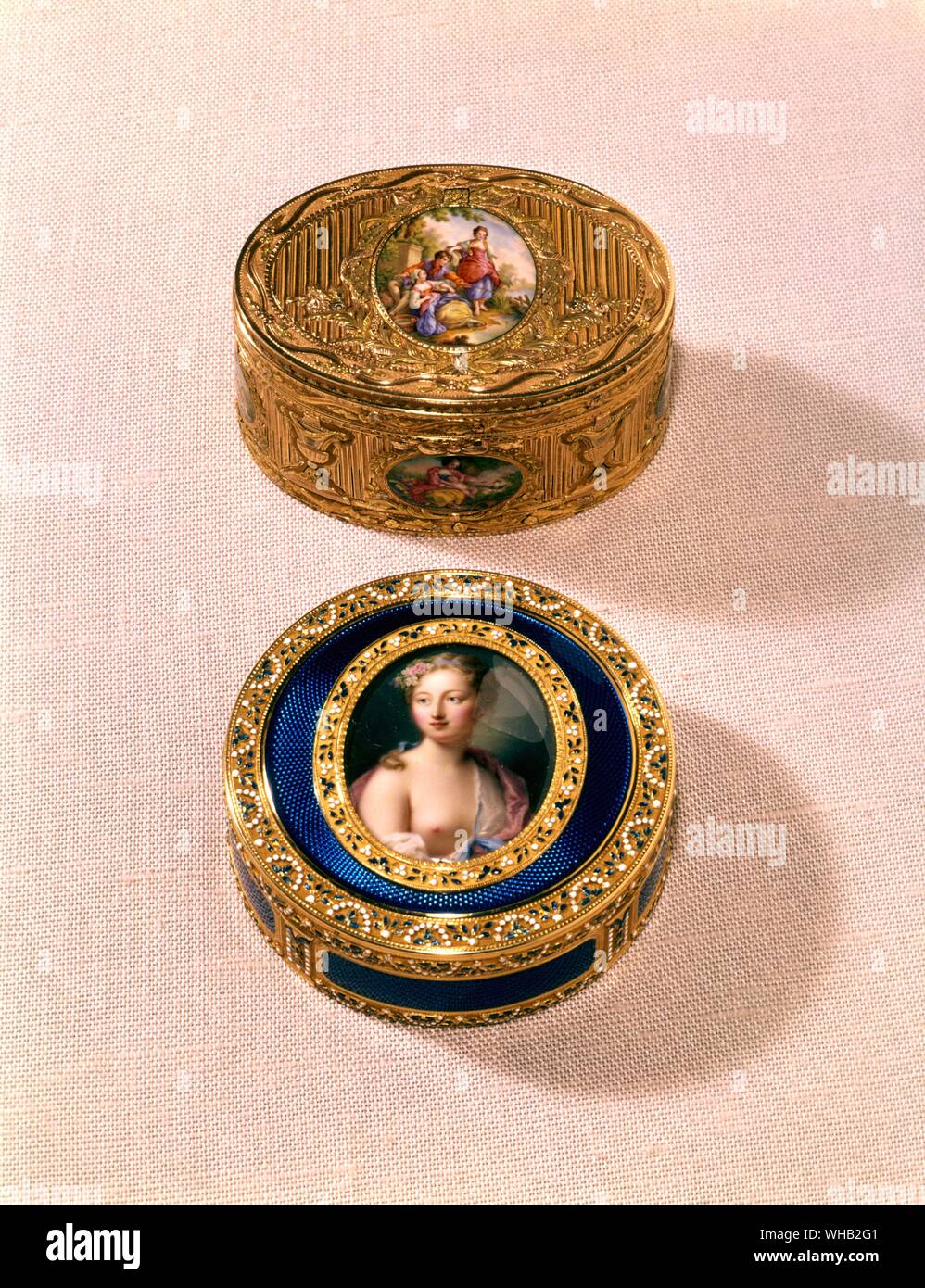 Snuff box Tinted gold, set with enamelled plaques. A watch by Fres Wiss and Amalric, is inserted in the lid, and a musical box in the bottom. Maker's mark. DMC crowned.. French second half of the 18th century. Snuff box gold decorated with blue translucent enamel. In the lid is an emalled miniature of a lady wearing flowers in her hair, after Rosalba Carriera. French made. Stock Photo