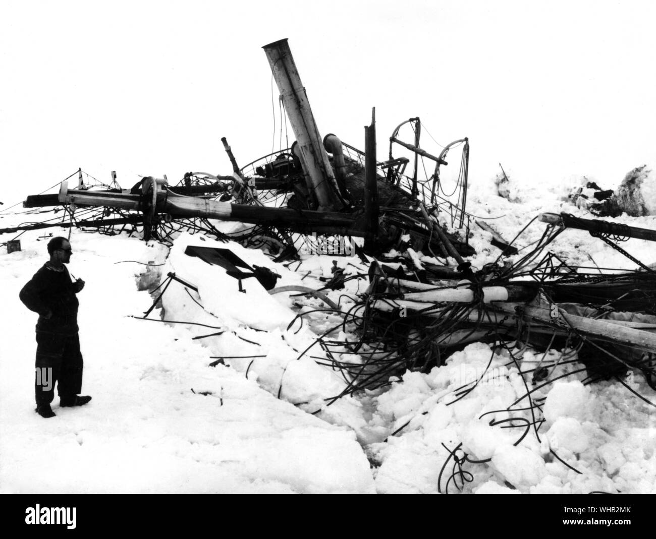 Frank Wild examining the wreckage of Endurance on the Shackleton Expedition 1914-16 Stock Photo